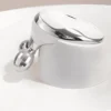 Massageador facial com microcorrente EMS e suporte branco